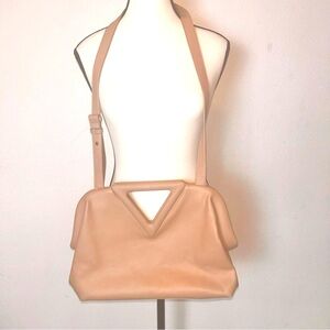 Vintage three and one convertible bag.  Color is pale pink cream neutral color.
